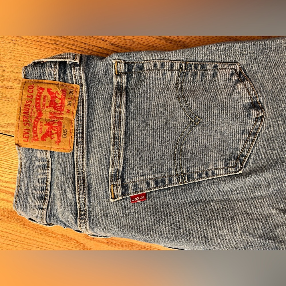 Levi's Men's Straight Light Blue Denim Jeans with Brown Leather Patch